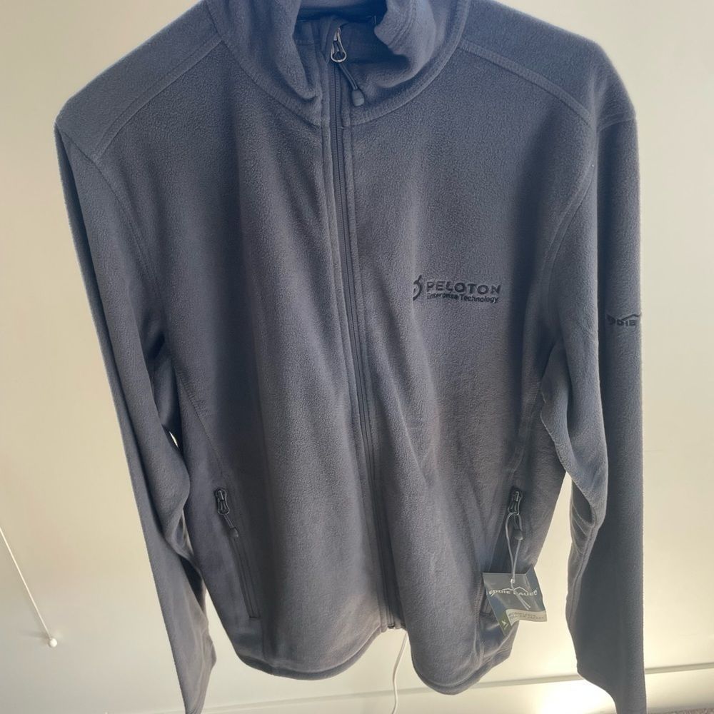 Peloton x Eddie Bauer medium grey full-zip fleece.Brand new never worn with tags